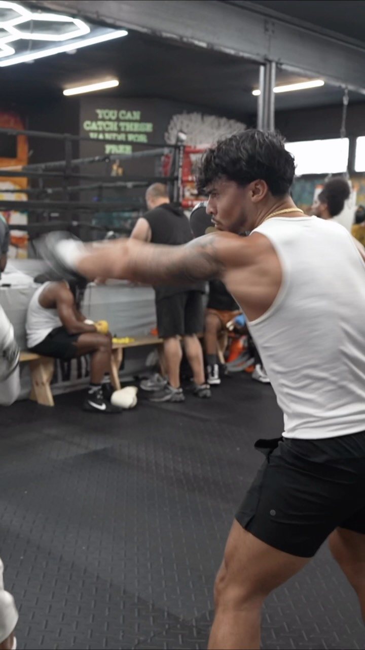 Shadow boxing on the floor of a boxing gym