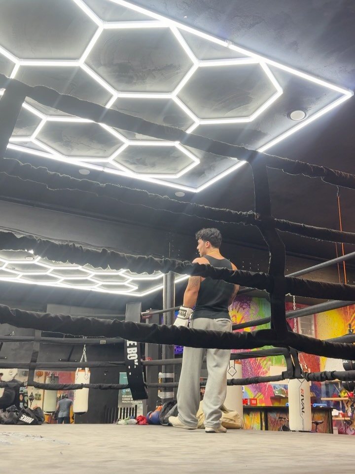 Ben alone in the ring at the boxing gym